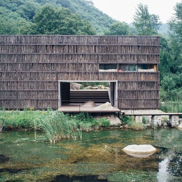natural reed wood siding cabin on water